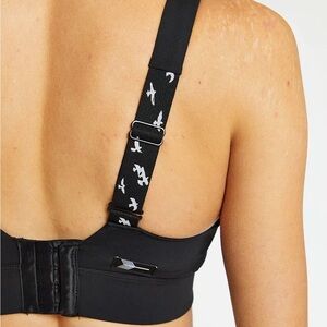 Oiselle running Queen sports bra in navy blue bird pattern 34D